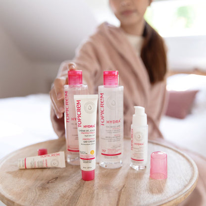 ტოპიკრემი - დამატენიანებელი მზისგან დამცავი სახის კრემი SPF50