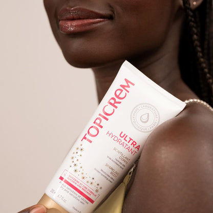 ტოპიკრემი - დამატენიანებელი ტანის რძე ოქროსფერი ბზინვარების ეფექტით